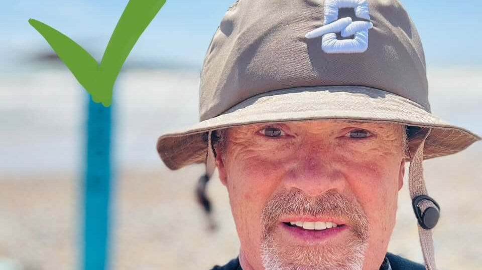 BangProof Helmet Review 2025 | Stylish CE Certified Water Helmets UK, man wearing a sun hat by the beach.