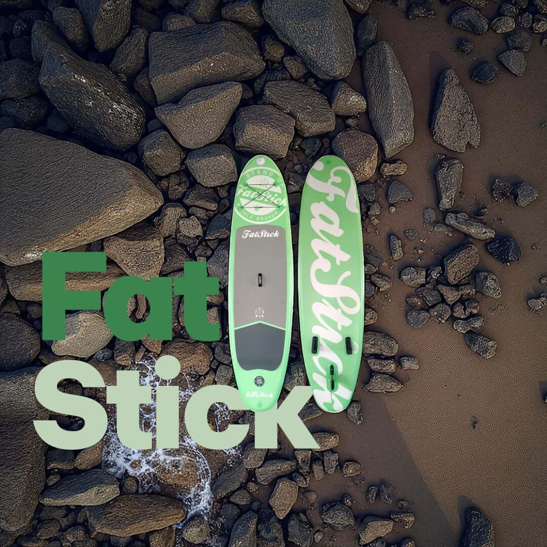 Fatstick AirStick 10'6 Inflatable SUP Package 2026 on a rocky beach background.