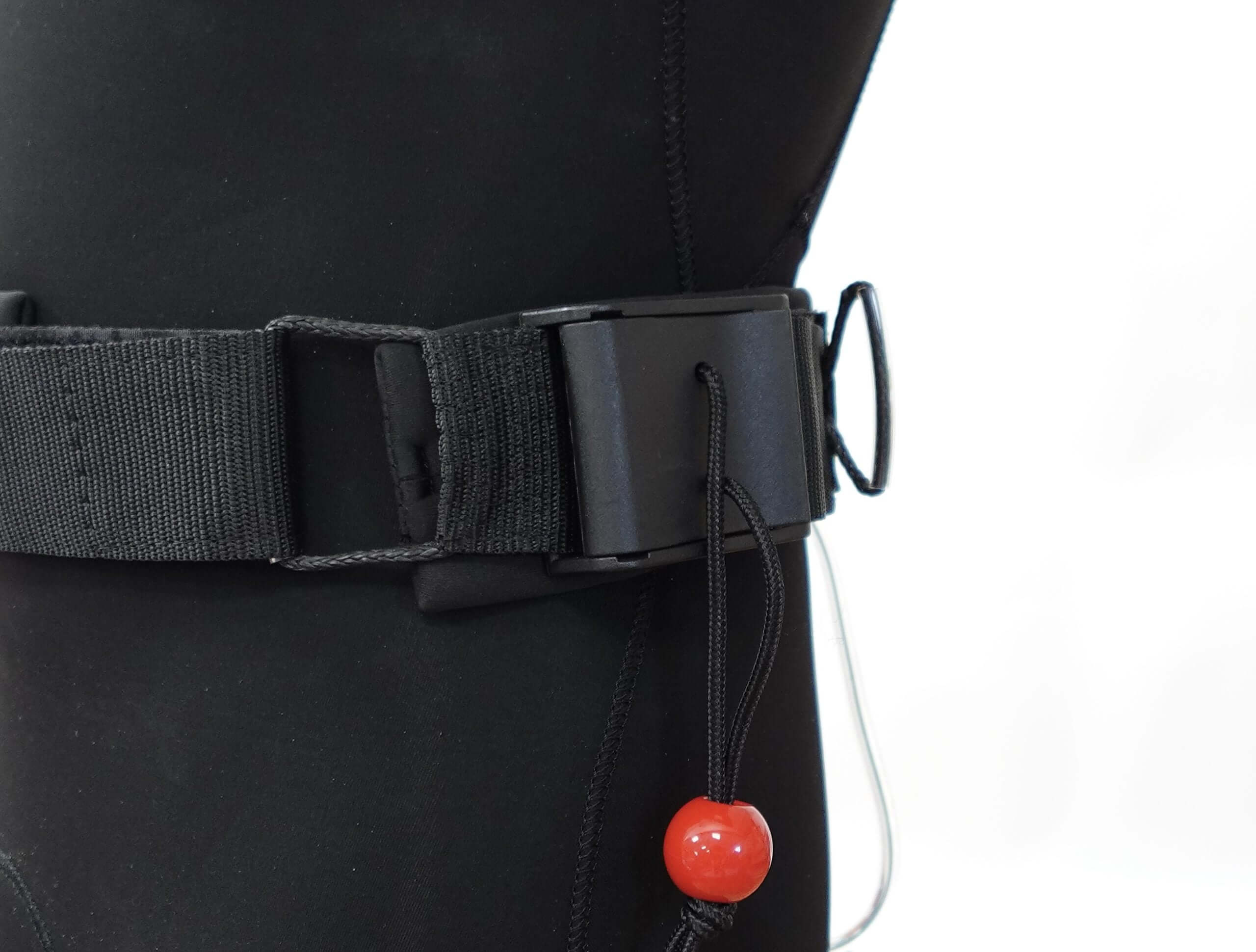 Wingfoil board waist leash connection detail, showcasing the secure buckle and safety features of the FBC Board Waist Leash V2.