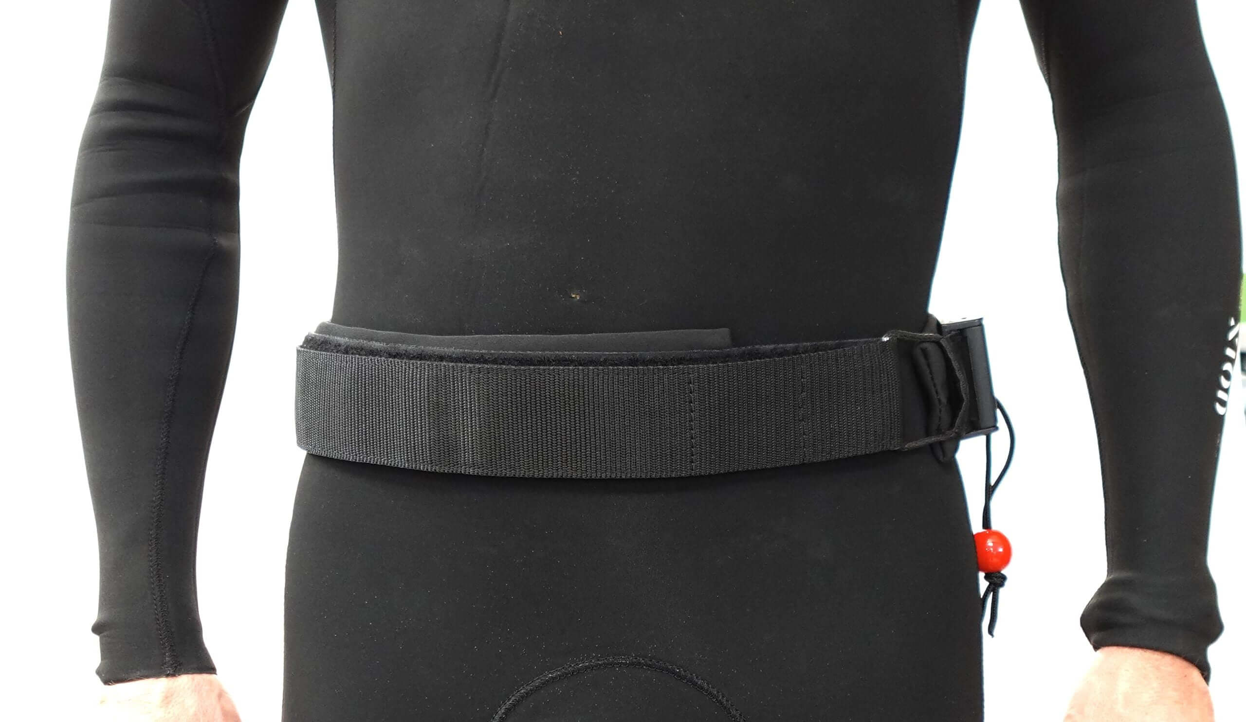 Wingfoil board waist leash worn by a person in a wetsuit, designed for safety and control during water sports.