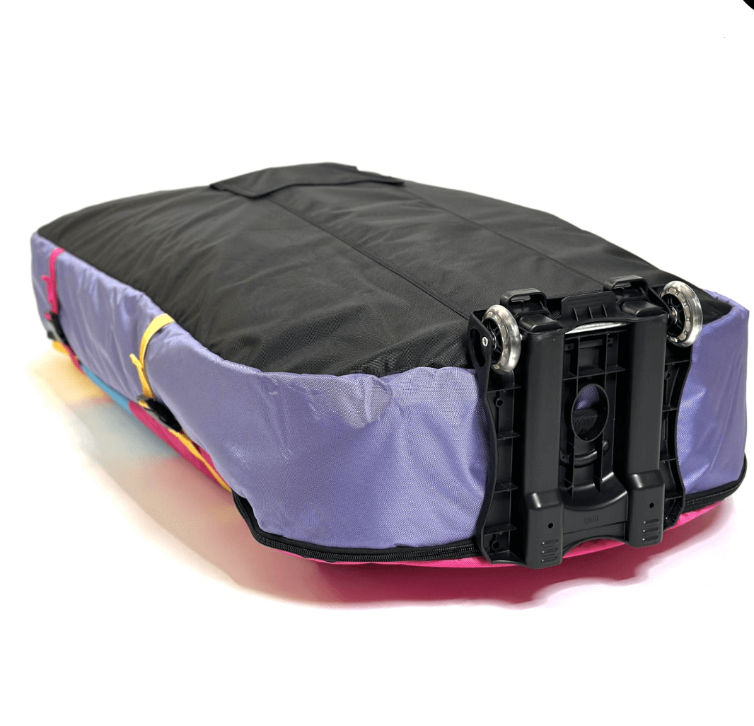 FBC Wingfoil travel bag showing its lightweight design and durable wheels for easy transportation.