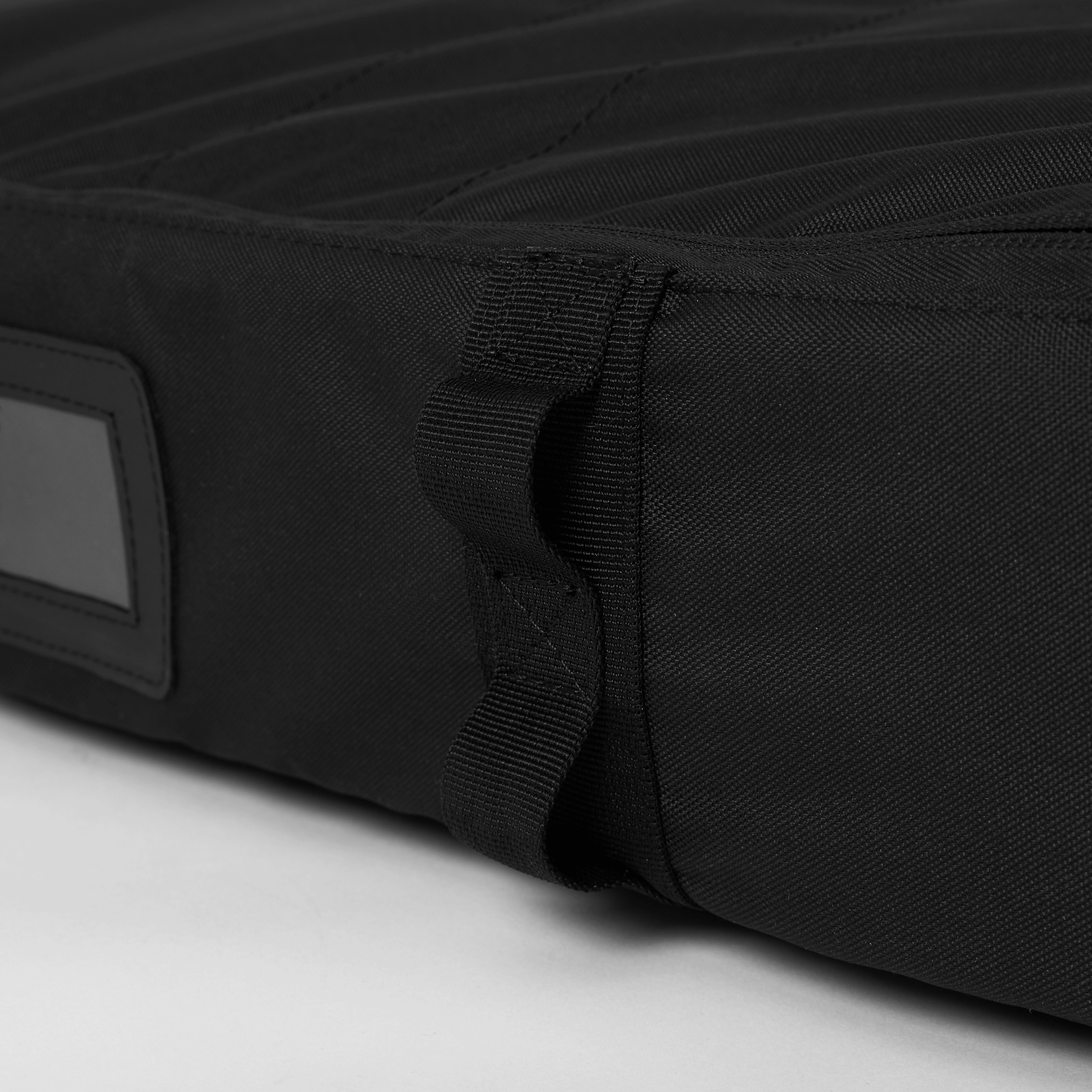 Gearbag Foil - Black - 2026 close-up detail showing the padded exterior and tie-down system for secure transport.