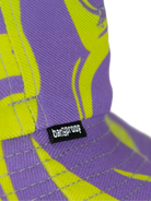 Close-up of a colorful Bangproof hat featuring a vibrant design and the Bangproof logo.
