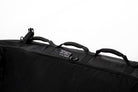Black carrying case with handles and straps on a white background