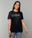 Model wearing Northern Watersports Black Logo Tee – Short Sleeve against a gray background.