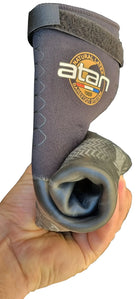Atan Maddison GECKO Split Toe Boots 3mm | Barefoot Feel Wetsuit Boots rolled up in a hand.