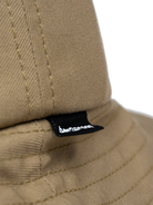 Close-up of the Bangproof Helmet V2 fabric and stitching, showcasing the quality and detail of the design.