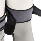 Close-up of knee and shin protection sleeves for wingfoil by FORWARD WIP, showcasing adjustable straps and flexible material.