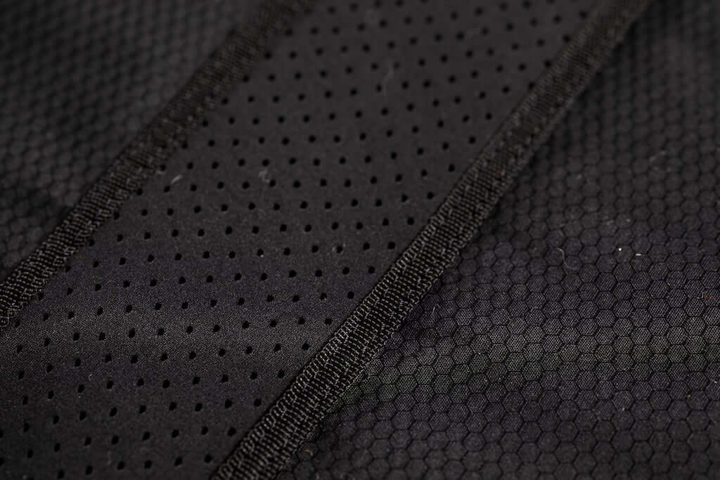 FBC Midlength Adjustable Bag Pro+ | Downwind/Wingfoil Bag fabric detail with perforated texture and stitching.