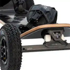 MBS Comp 95 Mountainboard close-up showing sturdy wheels and bindings for optimal performance and control.