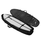 Saga Surf Boardbag - Black - 2026 with a surfboard inside, featuring water-repellent fabric and comfort carry handles.